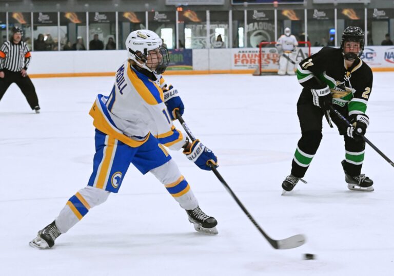 Aberdeen forward Briggs Medill takes a shot on goal during the second period against Oahe on Sunday, Nov. 23 in the Odde ice Center. The Cougars lost 6-2. Aberdeen Insider photo by Robb Garofalo.