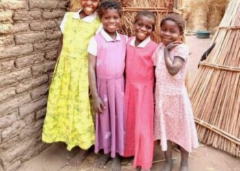 Bag of dresses from Hutterite colony sparks mission to assist African families 1 Four Malawi girls wearing dresses they received from Mommy Missions. Courtesy photo.