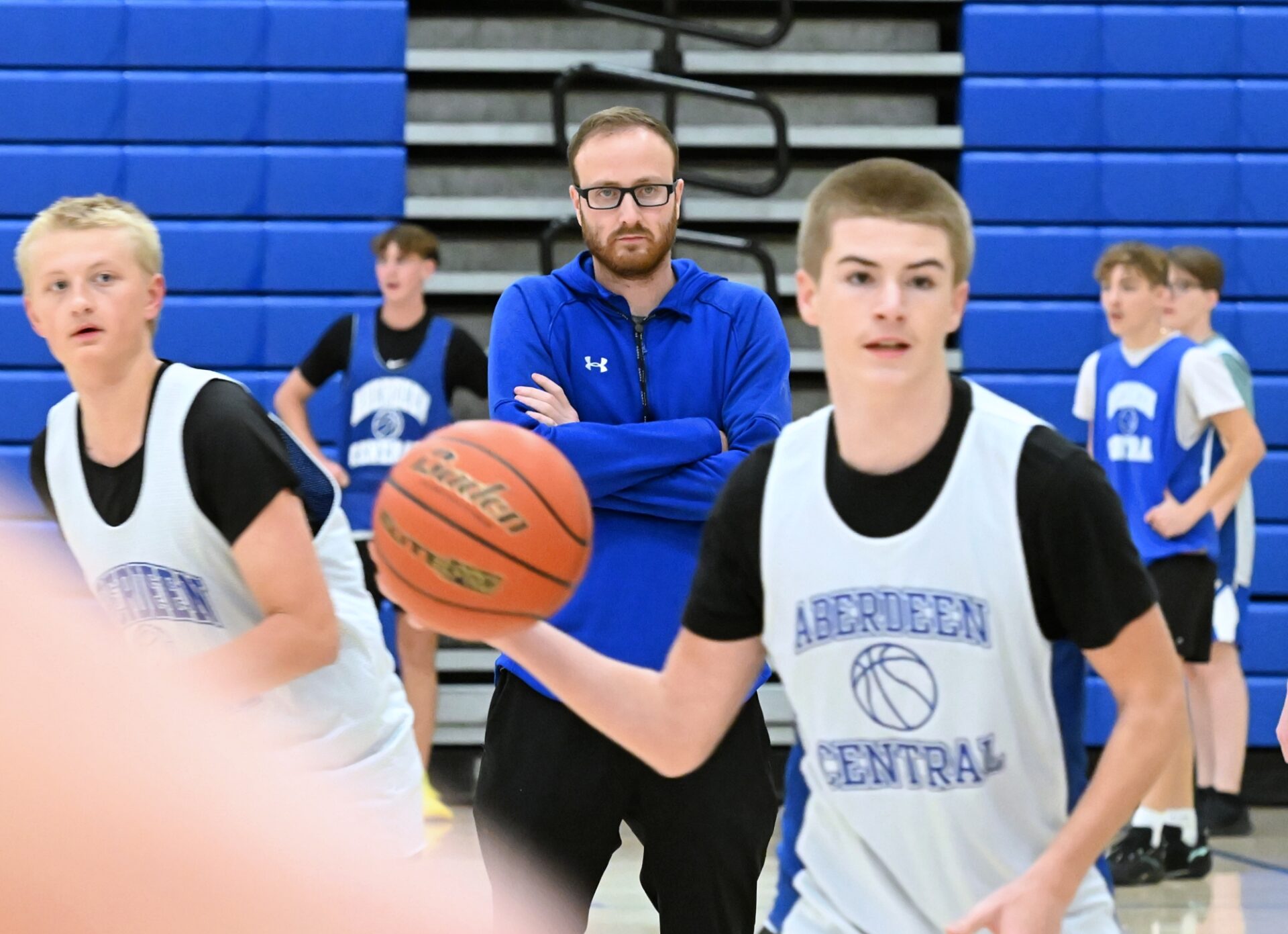 Aberdeen Central head boys basketball coach Colton McClemans watches his team during drills in practice. It's McClemans' first season leading the Golden Eagles. Aberdeen Insider photo by Robb Garofalo.