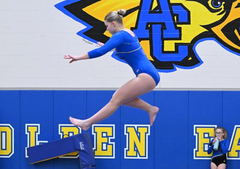 Aberdeen Central's Alexis Bomesberger competes on the balance beam during Central's gymnastics dual with Jamestown Thursday, Dec. 4 at Central High School. Aberdeen Insider photo by Robb Garofalo.