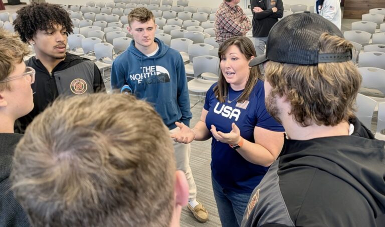 DeAnna Price, a three time olympian in the women's hammer throw, visited with Northern State University athletes after speak on Friday, Nov. 5 at the Barnett Center. Aberdeen Insider photo by Scott Waltman.