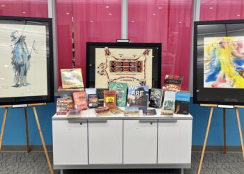 Three paintings by Lakota artists were recently found and are now on display at K.O. Lee Aberdeen Public Library. They include, from left, "Standing Bear" by Arthur Amiotte and "Spirit of the Buffalo" and "Buffalo Calf Woman" by Vic Runnels. Aberdeen Insider photo by Reagan Bierschenk.