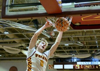 Northern State's Ben Bowen throws down a two-hand slam during the first half against Minnesota Duluth Thursday, Dec. 11 inside Wachs Arena. Bowen had eight points in a 79-62 loss to the Bulldogs. Aberdeen Insider photo by Robb Garofalo.