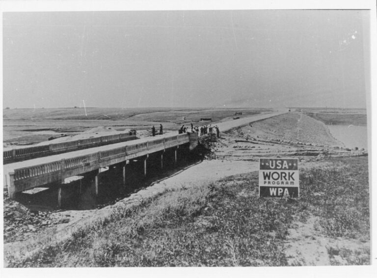 Drought-stricken farmers work on Richmond Lake dam in Brown County in the 1930s. Farmers who had been wiped out by drought helped finishe a dam and bridge for a 1,000-acre artificial miles north of Aberdeen. The structure now needs to be replaced. Photo Courtesy of the South Dakota Historical Society.