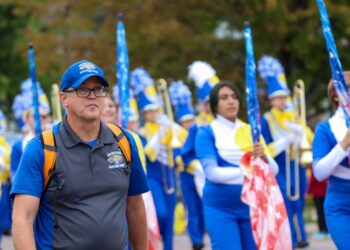 The Aberdeen Central Marching band with director Jeremy Schutter. Schutter will play trombone in the Rose Parade on Jan. 1, 2026. Photo courtesy of Aberdeen Public Schools.