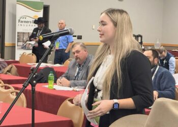 Participating in policymaking is something Farmers Union senior advisory council member and Kimball cattle producer Cadence Konechne, 17, also enjoys. Photo courtesy of the South Dakota Farmers Union.