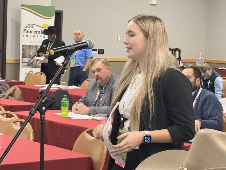 Participating in policymaking is something Farmers Union senior advisory council member and Kimball cattle producer Cadence Konechne, 17, also enjoys. Photo courtesy of the South Dakota Farmers Union.