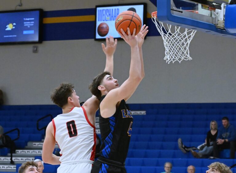 Aberdeen Central's Brenner Waldrop scores on an offensive rebound past Sturgis' Gage West during the fourth quarter Saturday, Dec. 20 in Golden Eagles Arena. Waldrop had eight points and seven rebounds in a 62-60 win. Aberdeen Insider photo by Robb Garofalo.