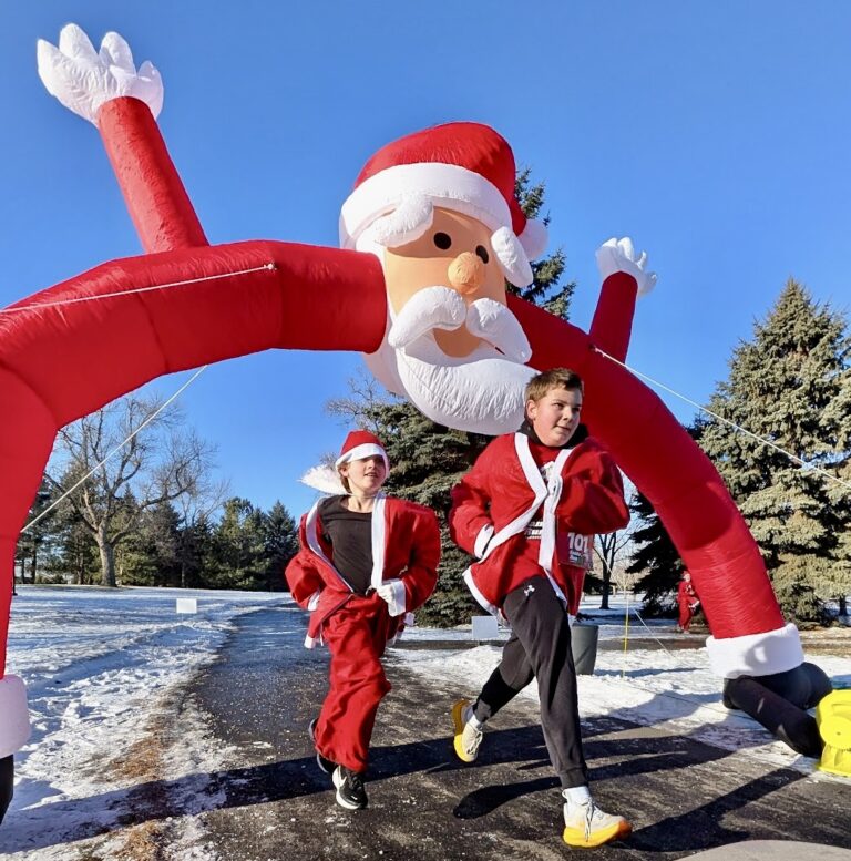 Nearly 200 people braved windy and sometimes slippery conditions on Saturday, Dec. 20 for the 2025 Santa Run at Wylie Park. The event was a fundraiser for the Warner High School cross-country team. Aberdeen Insider photo by Scott Waltman.