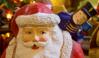 Garden of West Hill transforms Aberdeen home with extraordinary Christmas displays 1 A paper machete Santa standing over 2 feet fall is one of the unique decorations Kelly Miller has collected throughout the years. He enjoys arranging a lavish Christmas display in his home each holiday season. Aberdeen Insider photo by Shannon Marvel.