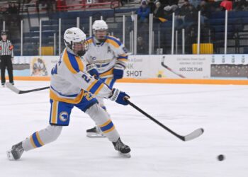 Aberdeen Cougar forward Ridgly Wasem takes a shot on goal during the third period against Brookings Saturday, Dec. 27 at the Odde Ice Center. The Rangers skated to a 4-0 win. Aberdeen Insider photo by Robb Garofalo.