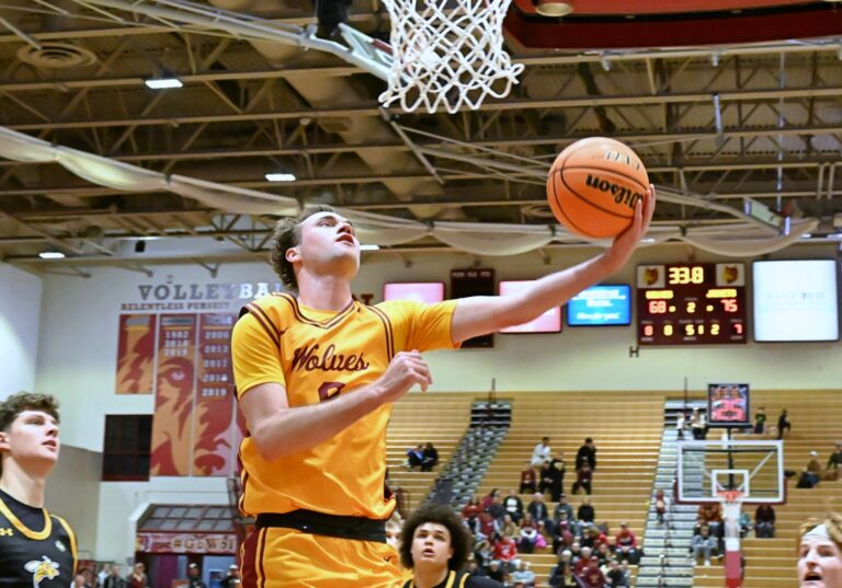 Northern State's Josh Book drives and scores on an up-and-under layup during the second half of the Wolves game against No. 15 Black Hills State Thursday, Jan. 1 in Wachs Arena. Book had 22 points in a 77-70 loss to the Yellow Jackets. Aberdeen Insider photo by Robb Garofalo.