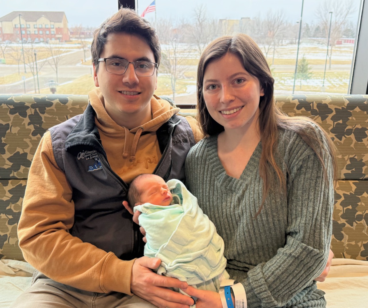 New Year's baby arrives three weeks before due date 1 Hayden and Jessica Snyder hold their newborn son, Harlan Mathias, who was the first baby of the new year born Jan. 1 at Sanford Aberdeen Medical Center. Aberdeen Insider photo by Elisa Sand.