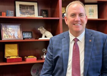 Alan LaFave, the new president at Northern State University, has various items on display in his office, including a wolf statue he received from the former dean of the Fine Arts Department. Aberdeen Insider photo by Elisa Sand.