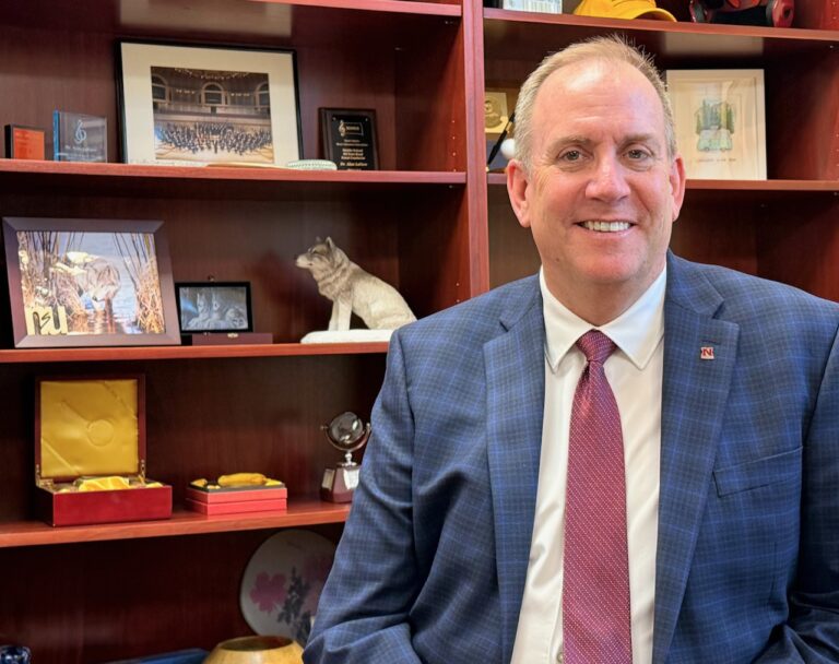 Alan LaFave, the new president at Northern State University, has various items on display in his office, including a wolf statue he received from the former dean of the Fine Arts Department. Aberdeen Insider photo by Elisa Sand.