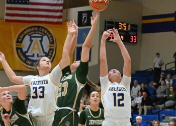 Aberdeen Central's Kennadi Withers, right, and Lauryn Burckhard battle Sioux Falls Jefferson's Brinley Altenburg for a rebound during the third quarter Saturday, Jan. 10 at Golden Eagles Arena. Withers came away with the board, helping Central log a 60-38 victory. Aberdeen Insider photo by Robb Garofalo.