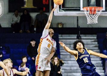 Marshawn Smith of Northern State takes a shot against Augustana's Amari Westmoreland-Vendiola during the Wolves' 91-88 victory Saturday, Dec. 10 in Sioux Falls. Photo courtesy of Bartsch Photography.