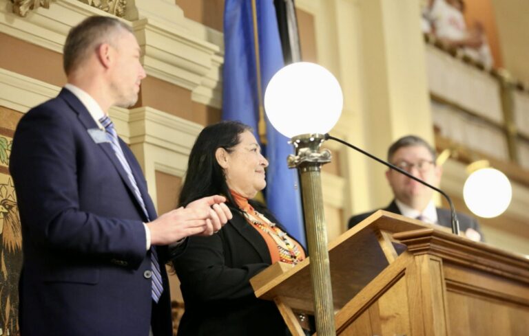 Rosebud Sioux Tribe President Kathleen Wooden Knife delivers the State of the Tribes Address on Jan. 14 at the State Capitol in Pierre. Alongside her are House Speaker Jon Hansen, left, and Lt. Gov. Tony Venhuizen, right. South Dakota Searchlight photo by Meghan O’Brien.