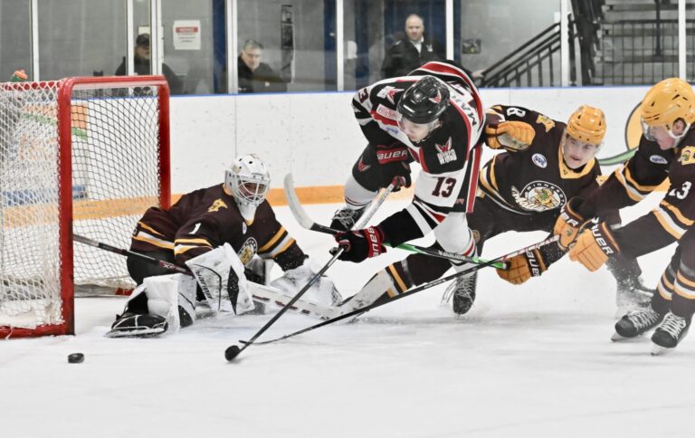 The shot of Aberdeen forward Matthew Martin slides wide of the goal during the Wings' 6-4 North American Hockey League victory over the Minnesota Mallards Friday, Jan. 16 at the Odde Ice Center. Defending are Minnesota goalie Connor Mackenzie, Jan Jarbko (8) and Keanan Pearman. Aberdeen Insider photo by Scott Waltman.