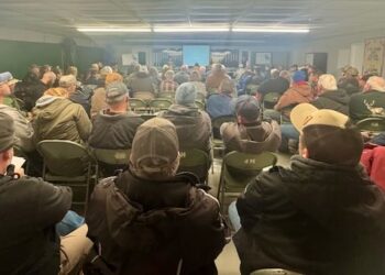 About 100 people listen to speakers at an informational meeting on Monday, Jan. 21 about a proposed 25,000-head dairy operation near Mina Lake. Aberdeen Insider photo by Shannon Marvel.