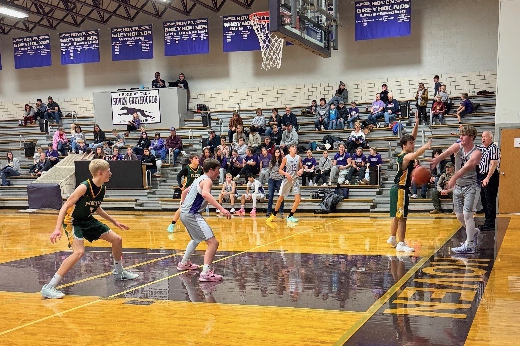 Hoven's Xavier Hobert inbounds the ball during a junior varsity boys basketball game this season. This is the first school year in decades Hoven hasn't been in a sports co-op with another school. Courtesy photo.
