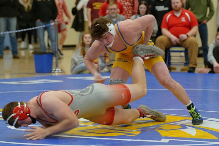 Aberdeen Central's Owen Ward hooks the leg of Chamberlain's Chisum Blum in their 190-pound final during the Lee Wolf Invitational Saturday, Jan. 31 at Golden Eagles Arena. Ward won the match by fall. Photo by Kevin Foss for the Aberdeen Insider.