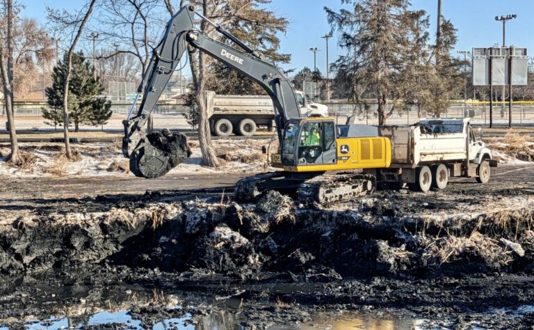 City workers clear sediment, sludge and other debris out of Moccasin Creek near 10th Avenue Southeast the afternoon of Friday, Jan. 30. Aberdeen Insider photo by Scott Waltman.