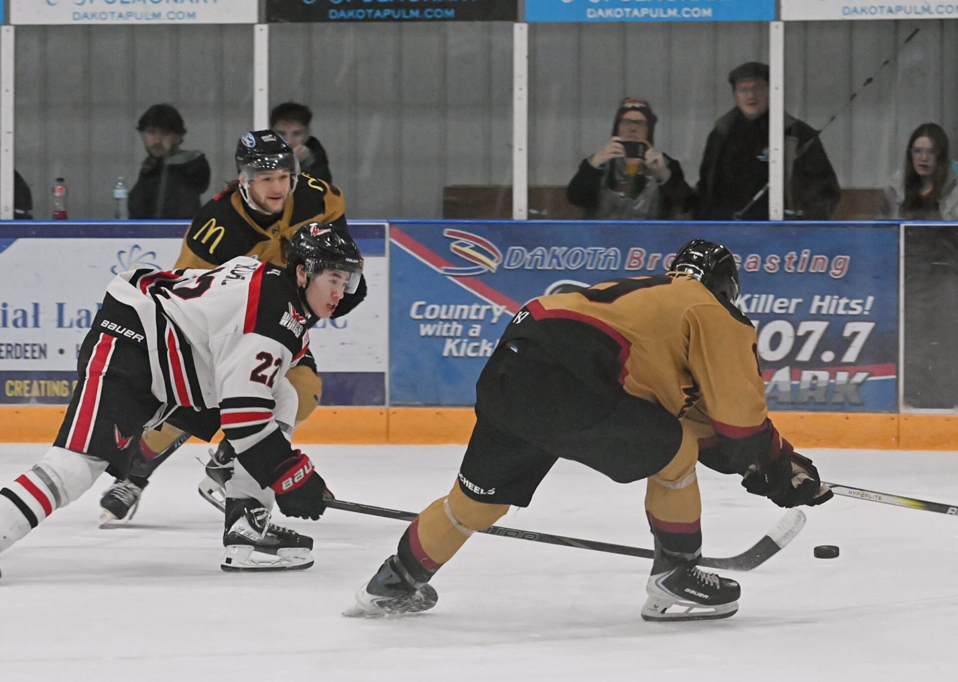 Aberdeen Wings forward Jibber Kuhl reaches out and deflects the puck into the empty net during the third period against the Minot Minotauros Saturday, Feb. 7 inside the Odde Ice Center. The Wings won the game 6-3. Aberdeen Insider photo by Robb Garofalo.