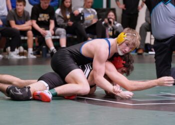 Aberdeen Central's Ridley Waldo maintains top position over Sturgis' Evan Juelfs during their 165-pound match at the Class A State Dual Wrestling Championship Friday, Feb. 13 in Pierre. Waldo won the match 14-5. Photo by Kevin Foss for the Aberdeen Insider.