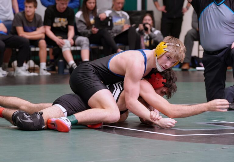 Aberdeen Central's Ridley Waldo maintains top position over Sturgis' Evan Juelfs during their 165-pound match at the Class A State Dual Wrestling Championship Friday, Feb. 13 in Pierre. Waldo won the match 14-5. Photo by Kevin Foss for the Aberdeen Insider.