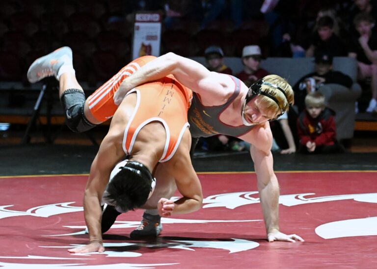 Northern State's Damen Pape takes down Jamestown's Rocker Aguilar during their 174-pound match Friday, Feb. 13 at Wachs Arena. Pape won by technical fall, 17-2, and the Wolves recorded a 52-0 victory. Aberdeen Insider photo by Robb Garofalo.