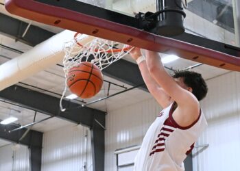 Brooks Jett throws down two of his game-high 22 points in Aberdeen Christian's 65-58 overtime win over Hitchcock-Tulare Monday, Feb. 16 at Aberdeen Christian Gym. Aberdeen Insider photo by Robb Garofalo.