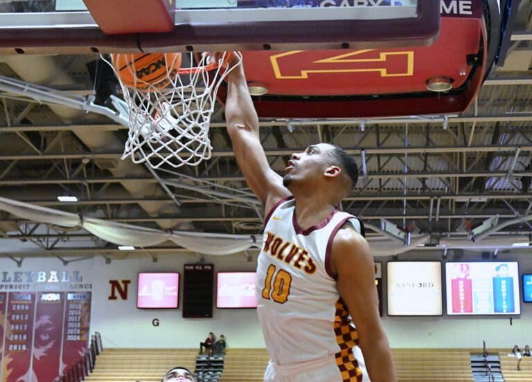 Northern State forward Simon Akena throws down two of his 13 points during the second half of the Wolves' 71-63 win over the University of Mary Thursday, Feb. 19 at Wachs Arena. Aberdeen Insider photo by Robb Garofalo.