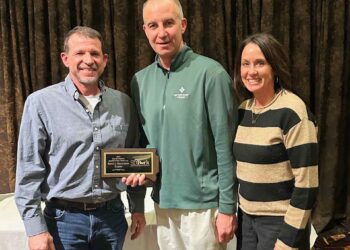 Brian Renelt of Wilmot, left, was named one of three 2025 South Dakota Master Pork Producers at the South Dakota Pork Congress in Sioux Falls on Jan. 14. Also pictured are Mark Vanderwerf, president of the South Dakota Master Pork Producers Association, and Cheryl Renelt, Brian's wife. Photo courtesy of SDSU Extension.