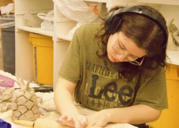 Aberdeen Central student April Flint works on her pineapple during the region ArtWars contest at Northern State University on Friday, Feb. 27. Aberdeen Insider photo by Elisa Sand.