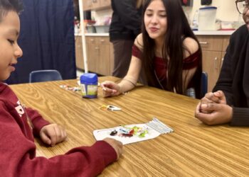 Central students Zoey Nelson, center, and Shenaz Suleiman entertain preschooler Ayden Jaimes during the first morning of Little Eagles Preschool at the ATEC Academy on Monday, March 2. Aberdeen Insider photo by Shannon Marvel.