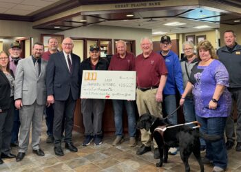 A $25,000 donation from Great Plains Bank gets Aberdeen Area Veterans a little bit closer to their goal of purchasing the depot on North Main Street. Pictured are, back row, from left, Susan Schaible-Heiser, Alan Ochsner, Joe Mehlhaff, Dale Strom, Pete Mehlhaff, Roger Schaible, Ron Krogman, Tom Croymans, Sean Johnson, Ruth VanSteinwyk, Shelley Ochsner and xxxx. Aberdeen Insider photo by Elisa Sand.