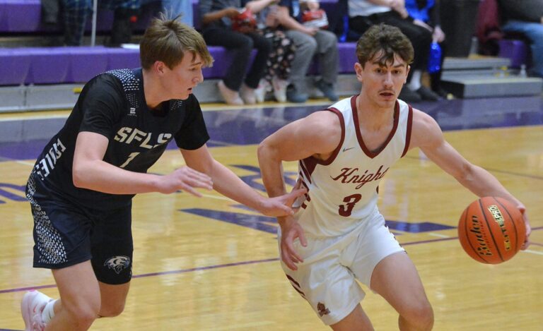 Aberdeen Christian's Luke Kaiser has the inside track to the basket against Sioux Falls Lutheran's Kade Matthies during their Class B SoDak 16 game Tuesday, March 10 at the Watertown Civic Arena. Kaiser had 15 points as Aberdeen Christian won 67-52 to qualify for the State B. Courtesy photo.