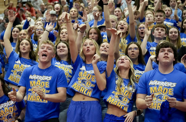 Castlewood fans cheer their team during the 2025 Class B state boys basketball tournament in Aberdeen. The Warriors are back for this year's State B, which begins Thursday, March 19. Photo courtesy of South Dakota Public Broadcasting.