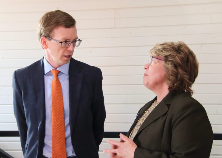 U.S. Rep. and Republican gubernatorial candidate Dusty Johnson speaks with Kelly Weaver, regional director for the Small Business Development Center, prior to a roundtable discussion on Monday, March 23 at Market on the Plaza. Aberdeen Insider photo by Elisa Sand.