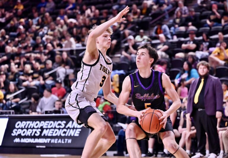 Groton's Karson Zak plays defense against Eddie Duffy of Stanley County in the seventh-place game of the Class A Boys State Basketball Tournament on Saturday, March 21 in Rapid City. Groton picked up a 61-43 victory, and Zak was named to the all-tournament team. Photo courtesy of South Dakota Public Broadcasting.