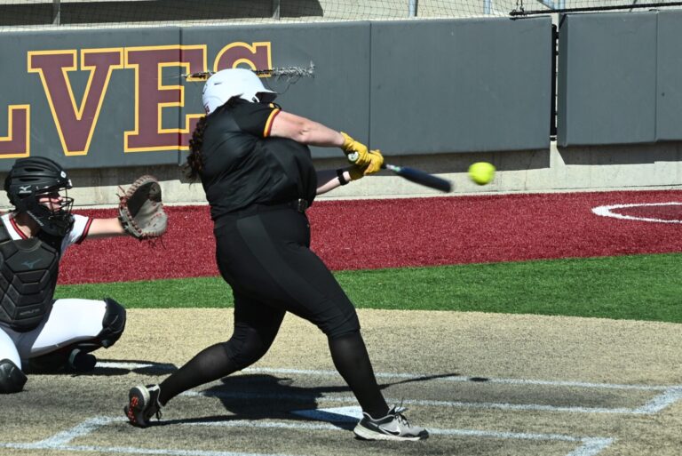 Northern State's Tevan Bryant lines an RBI single in the bottom of the sixth inning, tying the Wolves' game against St. Cloud State Sunday, March 29 at Koehler Hall of Fame Field. Northern lost the game 7- 2 in eight innings. Aberdeen Insider photo by Robb Garofalo.