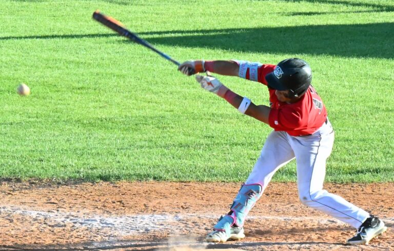 Jehiel Aviles of the Aberdeen Smittys reaches out and makes contact during 2025 game against Pierre at Fossum Field. Aberdeen Insider photo by Robb Garofalo.