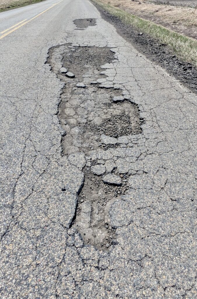 County Road 14 south of the Aberdeen Regional Airport is one of the roads on the Brown County Highway Department's list of improvements for this summer. Aberdeen Insider photo by Scott Waltman.