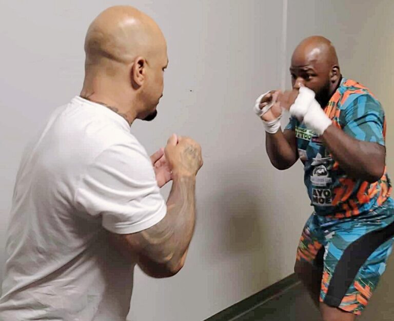 Aberdeen's Corey "King Smilez" McIntosh, right, does light sparring with former UFC heavyweight fighter Houston Alexander. McIntosh boxes Cayman Audie Saturday, April 25 for the vacant Ignite Fights USA Minnesota heavyweight title. Courtesy photo.