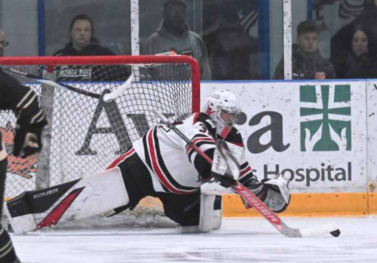 Aberdeen goalie Willum Braun reaches out to gather the puck during the first period of Game 4 of the 2026 Robertson Cup Central Division Semifinals against Bismarck on Saturday, April 25 at the Odde Ice Center. Braun returns to the Wings' roster this season. Aberdeen Insider photo by Robb Garofalo.