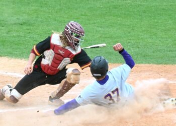 Northern State catcher Gehrig Larrigan puts the tag on Minnesota State Mankato's Owen Sikkini at home to get the out Saturday, April 25 at Fossum Field. Northern lost 13-2 and was swept in a three game series. Aberdeen Insider photo by Robb Garofalo.