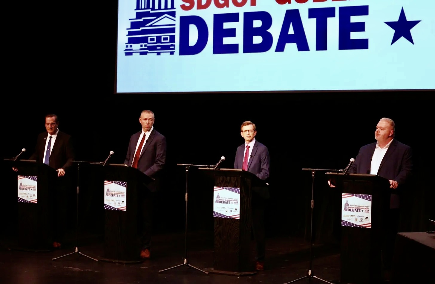 The four Republican candidates for governor took the stage in one last debate on Monday, April 27 at the Sioux falls Washington Pavilion. Candidates are, from left, Gov. Larry Rhoden, state House Speaker Jon Hansen, U.S. Rep. Dusty Johnson and Aberdeen businessman Toby Doeden. South Dakota Searchlight photo by Joshua Haiar.