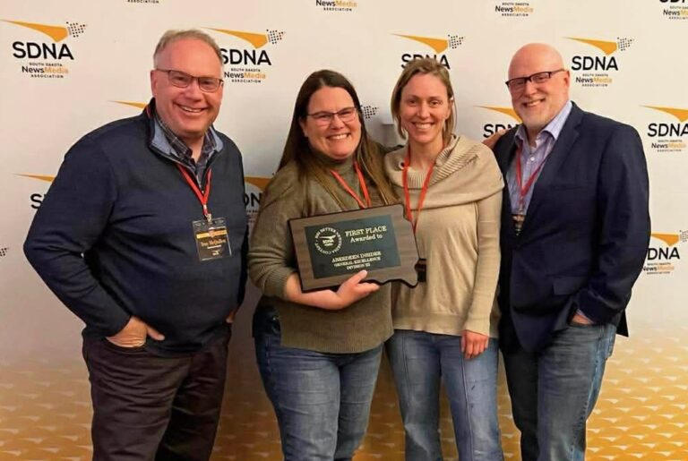 Aberdeen Insider Publisher Troy McQuillen, Associate Editor Elisa Sand, reporter Shannon Marvel and Managing Editor Scott Waltman gather after the South Dakota NewsMedia Association banquet on Friday, May 1 in Deadwood. The Insider won the general excellence award. Aberdeen Insider photo by Dani McQuillen.