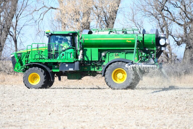 A spray rig takes on product as it completes application of fertilizer before farmers start planting this spring. Photo courtesy of Agtegra.